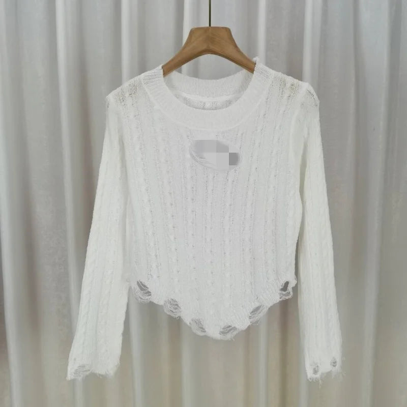 Women Long Sleeve O-Neck Solid Color Hollow Out Tassel Fringe Knitted Shirt