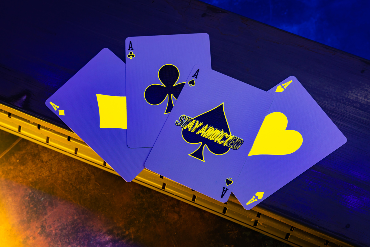 Bicycle Neon Rider Back Yellow-Starburst Deck Playing Cards- Card-Addiction.com- {{Product type}}