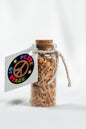 Glass Bottle Filled with shavings and stardust from the original 1969 Woodstock stage wood- Peace Of Stage LLC- {{Product type}}
